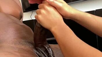 oiled amateur couple's steamy handjob massage kickoff