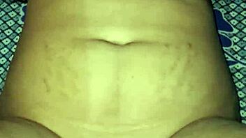 Indian bhabhi rams huge dildo deep in wet hairy pussy moaning