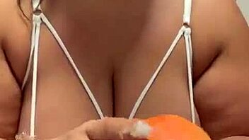 curvy bbw teases her huge tattooed ass with fetish fruit play