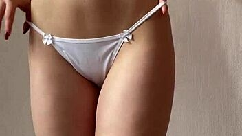 innocent redhead teases stripping lingerie for you