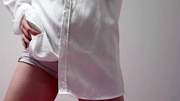 Playful cute brunette housewife smokes seductively in bra revealing petite curves!