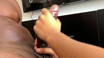 oiled amateur couple's steamy handjob massage kickoff