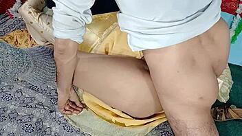 desi bride in yellow dress at country ranch wedding