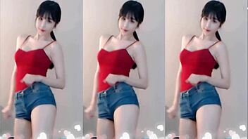 cute chinese girl dances sexy bouncing small tits