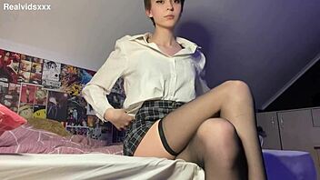 skinny short-haired beauty strips panties fingers shaved pussy teases feet to orgasm