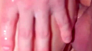 cum keeps flowing between her puffy pussy lips?