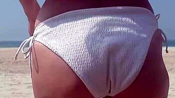 wanna see fat ass peeing in white bikini on beach?