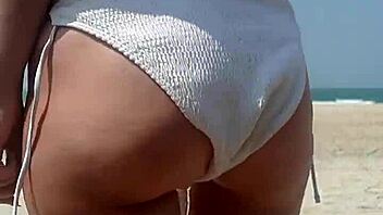 wanna see fat ass peeing in white bikini on beach?