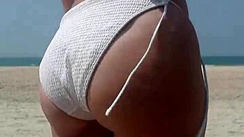 wanna see fat ass peeing in white bikini on beach?