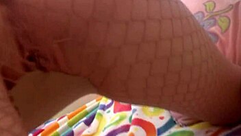 Genevive tears fishnet pantyhose grinds tight pussy on cock during sensual homemade massage