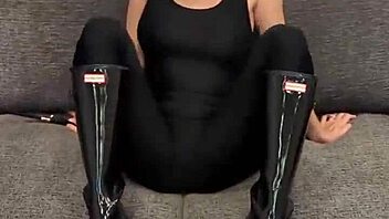 Black Bodysuit Hugs Ass in Shiny Hunter Boots