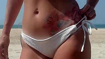 wanna see fat ass peeing in white bikini on beach?