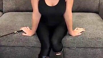 Black Bodysuit Hugs Ass in Shiny Hunter Boots