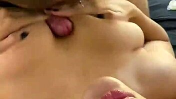 busty brunette babe gives sloppy titjob fun