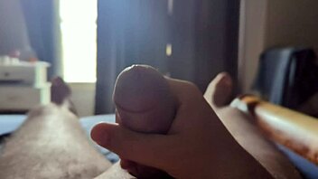 Masturbating Close-Up with Monster Cock as Sun Rays Hit Bedroom Window