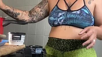 the wife films cooking videos online but really flashes her swollen young pussy