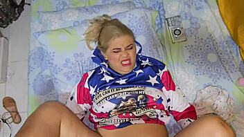 blonde latina babe savors tasty treat lounging on bed