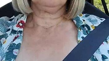 Naughty Housewife Flashes Tits in Car Selfie