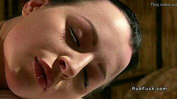 Busty lesbian masseuse fingers oiled brunette babe nuru