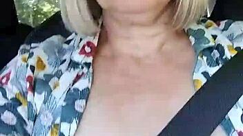Naughty Housewife Flashes Tits in Car Selfie