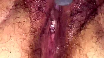 Hairy BBW milf fists her wet pussy till massive squirting orgasm