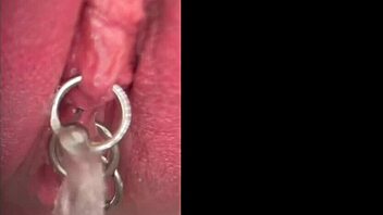 Close-Up Pissing Shaved Pussy Pierced Clit Dripping Wet