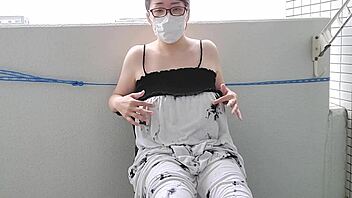 excited housewife masturbates intensely on balcony in japanese solo