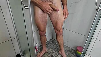 Morning shower footjob milf strokes cock perfectly!