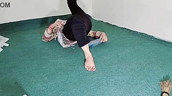 big ass indian maid flaunts curves in sheer black pajamas while cleaning