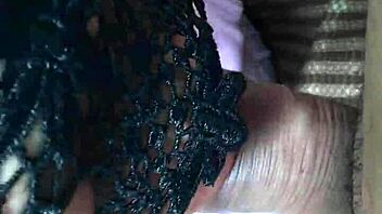 Chinese woman pours yogurt on treat and licks it up in playful Asian scene