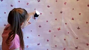 our first homemade gloryhole lets brunette suck cock through walls intensely