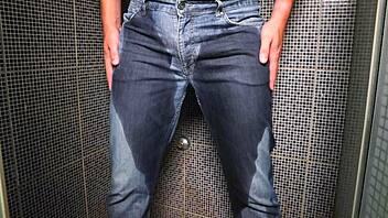 amateur dude soaks jeans peeing then blasts cum publicly