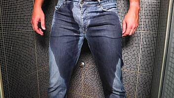 amateur dude soaks jeans peeing then blasts cum publicly