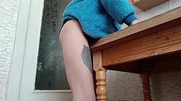 Skinny Brunette Fingers Pussy on Kitchen Counter