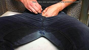 amateur dude soaks jeans peeing then blasts cum publicly