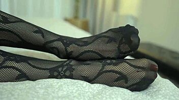 sexy blonde milf in fishnets gives amazing footjob