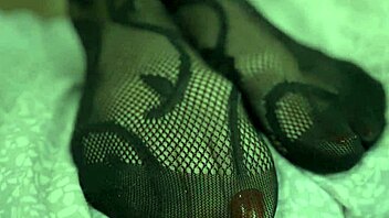 sexy blonde milf in fishnets gives amazing footjob