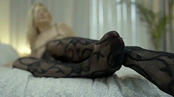 sexy blonde milf in fishnets gives amazing footjob