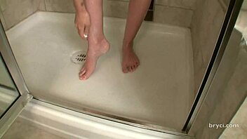 hey check this hot brunette's steamy shower curves