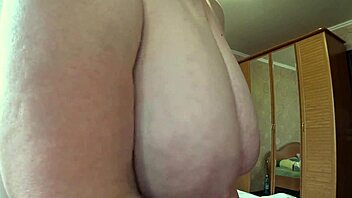 plump milf's huge natural tits close-up tease