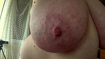 plump milf's huge natural tits close-up tease