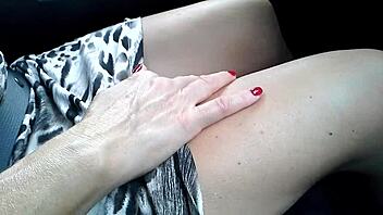 driving while fingering my wet mature pussy in the car