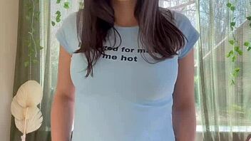 Curvy amateur teases huge natural tits slowly