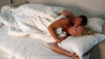 amateur couple savors slow spooning morning sex in bed