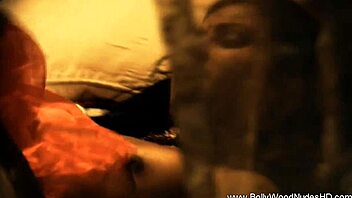 exotic brunette performs sensual striptease dance in glamorous setting