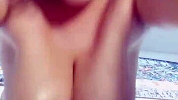 oiled chubby babe rides dildo with huge bouncing tits
