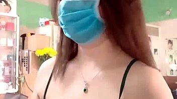 yên nhi trims hair with sexy big tits on display