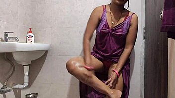 desi girl shaves smooth chut while bathing clear moan voice!