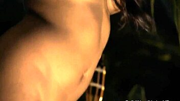 her sensual curves tease in erotic nude dance