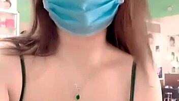 yên nhi trims hair with sexy big tits on display